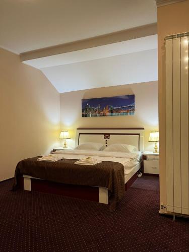Кровать или кровати в номере Francesca Residence