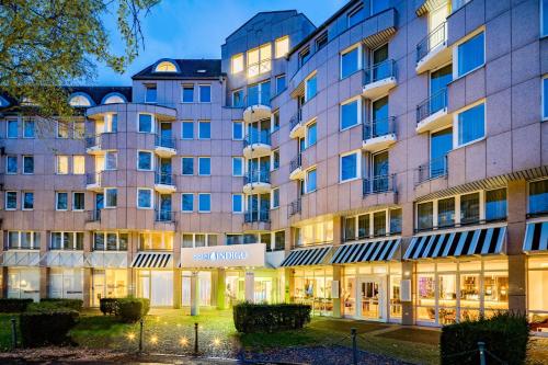 a rendering of the exterior of a building at Hotel Indigo - Dusseldorf - Victoriaplatz by IHG in Düsseldorf