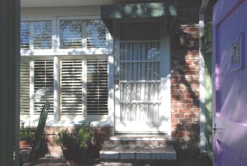 a front door of a house with a purple door at Carmel Garden Inn in Carmel