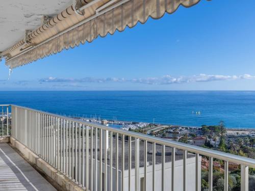 a balcony with a view of the ocean at Apartment Les Miradors by Interhome in Menton