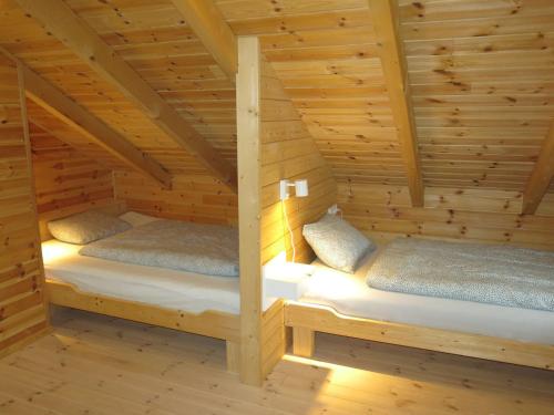Ένα ή περισσότερα κρεβάτια σε δωμάτιο στο Chalet Trollstua by Interhome