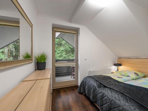 Postel nebo postele na pokoji v ubytování Apartment Harrachov Resident Vesna by Interhome