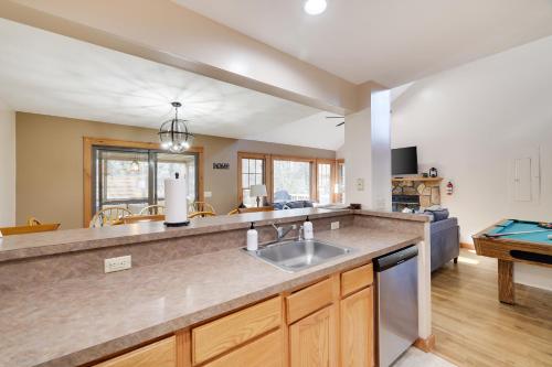 a kitchen with a sink and a counter top at Pocono Mountain Home , Hot Tub- 1 Mile To Skiing! in Tannersville