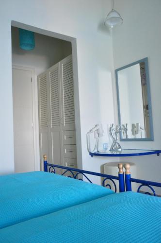 Кровать или кровати в номере ARTEMIS ROOMS