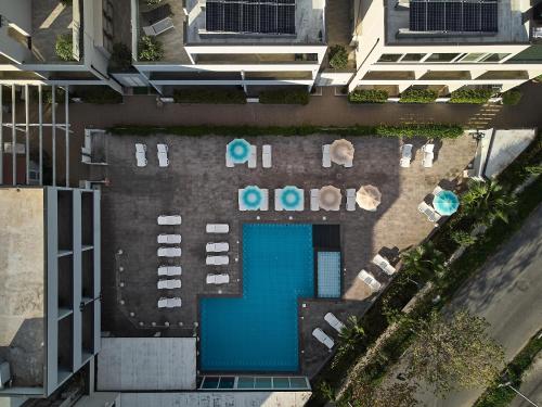 an overhead view of a swimming pool in a building at Golden Hotel in Marina di Cecina