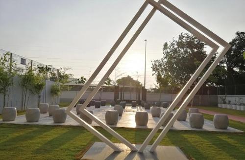 a sculpture in the middle of a park at 休闲民宿 Leisure Homestay @The Venus Sitiawan in Kampong Lumut Kiri