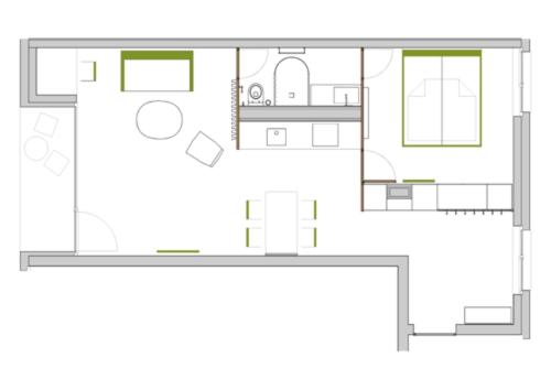 a floor plan of a house at Max Lodging Serviced Apartments in Munich