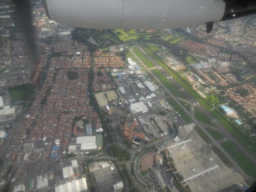 an aerial view of a city from an airplane at Hotel Nuquimar in Nuquí