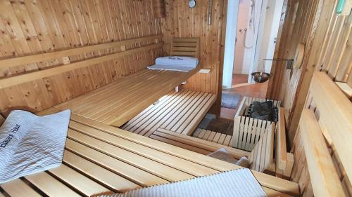 an overhead view of a wooden sauna with two beds at Haus Weitblick in Glückstadt