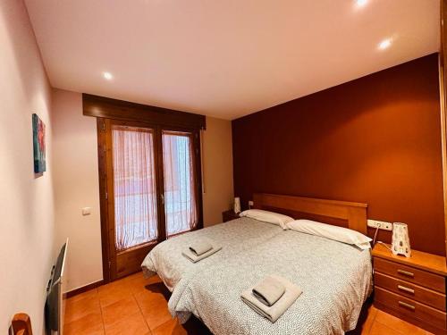 Ένα ή περισσότερα κρεβάτια σε δωμάτιο στο Apartamento Carlos Bielsa