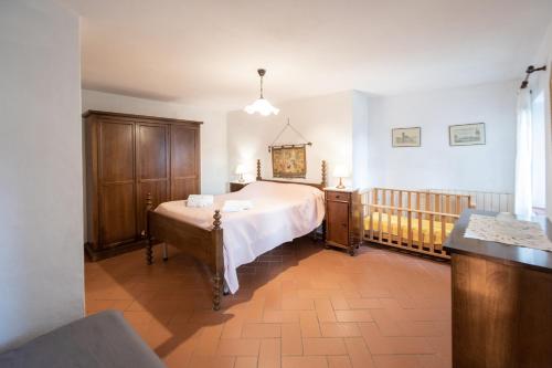 Postel nebo postele na pokoji v ubytování Casetta di Butia, Mimosa Apartment