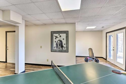 a ping pong room with a ping pong table at Deck and Game Room Blue Ridge Mountain Cabin! in Warne