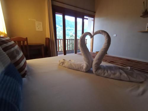 Postel nebo postele na pokoji v ubytování Gocta Miradors Deluxe