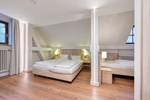 Hotel Schleuseにあるベッド