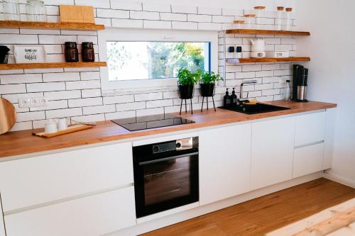 Una cocina o zona de cocina en Ferienhaus Visselheide