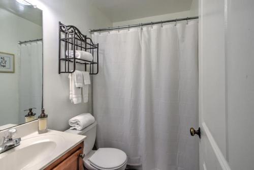 A bathroom at Gated Midtown Retreat near Overton Square