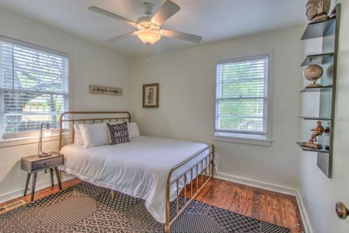 A bed or beds in a room at Gated Midtown Retreat near Overton Square