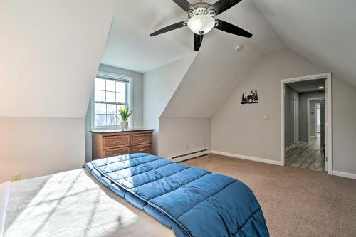 a bedroom with a ceiling fan and a bed at Spacious Home Near Bromley Mountain Ski Resort! in Manchester Center