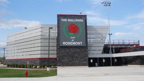 a building with a sign on the side of it at Holiday Inn Chicago O'Hare - Rosemont by IHG in Rosemont