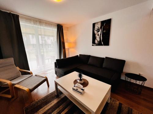 Гостиная зона в Libertatii Gardens Residences
