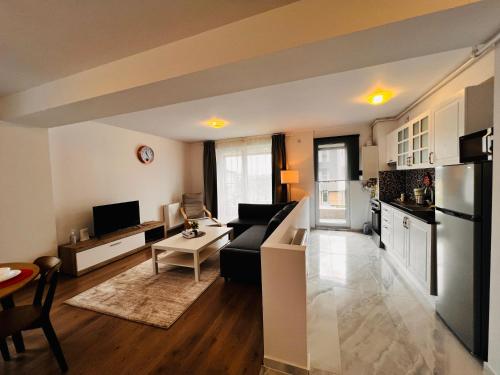 Кухня или мини-кухня в Libertatii Gardens Residences
