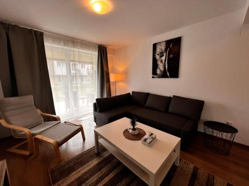 Гостиная зона в Libertatii Gardens Residences