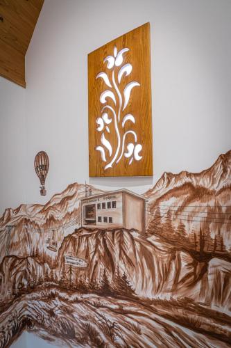 a drawing of a painting of a mountain at Domki Bukowianka in Murzasichle
