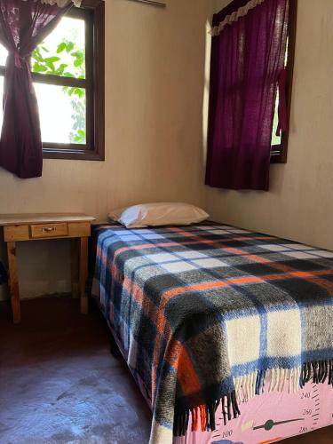 Katil atau katil-katil dalam bilik di Casa Qatzij - Guest House, Lake Atitlan