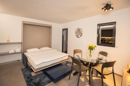 Postel nebo postele na pokoji v ubytování Residenza 3544