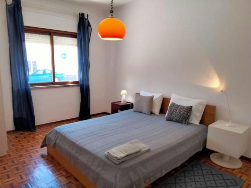 Postel nebo postele na pokoji v ubytování Casa Laranjeira