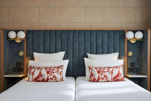 Postel nebo postele na pokoji v ubytování Best Western Saint-Louis - Grand Paris - Vincennes