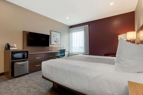 Postel nebo postele na pokoji v ubytování Best Western Plus Dauphin