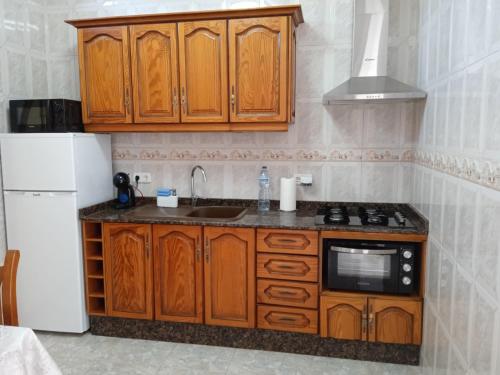 Køkken eller tekøkken på adosado cerca del mar