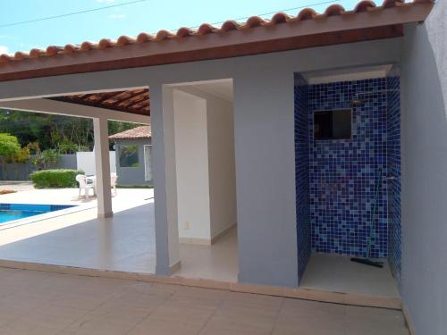 a view of a house with a swimming pool at APARTAMENTO 3 quartos no Taperapuan Duplex 450 mt da praia in Porto Seguro