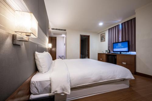 Hotel Bonzaにあるベッド