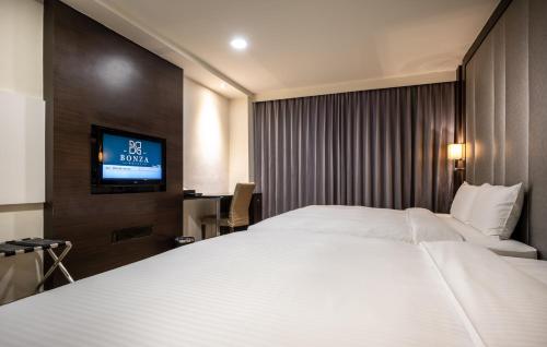 Hotel Bonzaにあるベッド