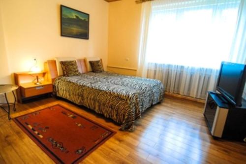 Krevet ili kreveti u jedinici u okviru objekta Apartamentai Vida