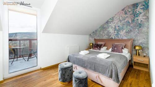 Postel nebo postele na pokoji v ubytování Wonder Home - Apartamenty blisko centrum, tuż przy kolei gondolowej i trasach Single Track