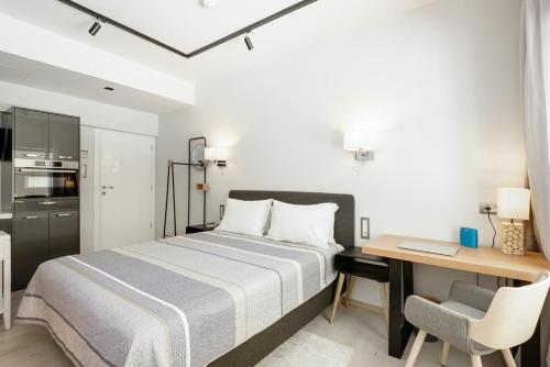 Кровать или кровати в номере Square Elegant Suites