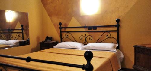 Ένα ή περισσότερα κρεβάτια σε δωμάτιο στο Hotel Motel Est