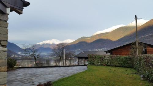 a view of the mountains from the backyard of a house at Agriturismo Stella Orobica in Albosaggia
