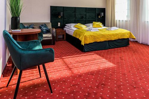 Posteľ alebo postele v izbe v ubytovaní Hotel Stara Gorzelnia