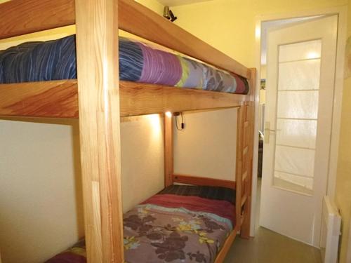Poschodová posteľ alebo postele v izbe v ubytovaní Boost Your Immo Barèges Artigalas PM55