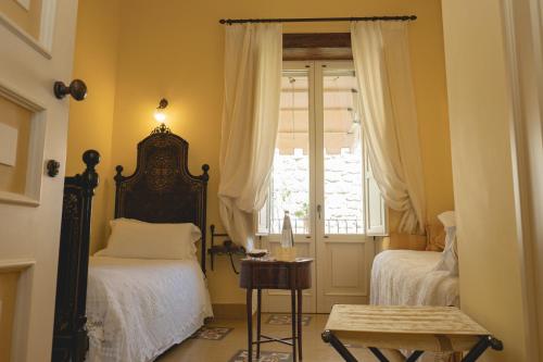 Ένα ή περισσότερα κρεβάτια σε δωμάτιο στο Casa Turchetti