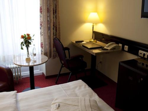 Cama o camas de una habitación en Sachsenwald Hotel Reinbek