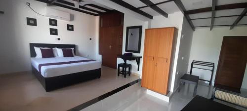 Ένα ή περισσότερα κρεβάτια σε δωμάτιο στο Sobaya Residence