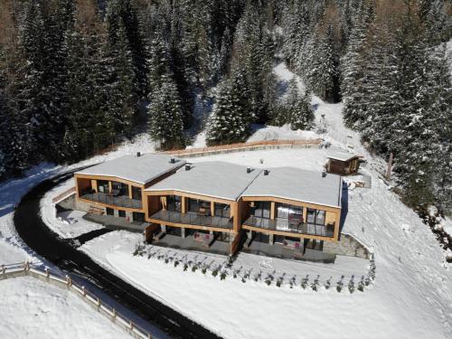 an aerial view of a house in the snow at Stelza Nature Chalet in Val di Vizze