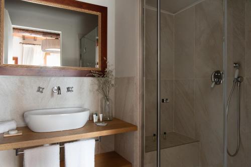 a bathroom with a sink and a shower at Relais Villa Olmo - Place of Charme in Impruneta