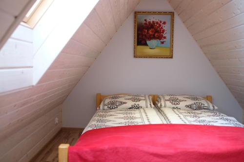 Ένα ή περισσότερα κρεβάτια σε δωμάτιο στο Apartamenty Magiczny Kącik