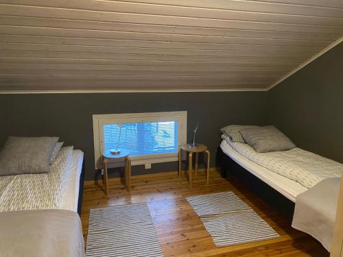 Postel nebo postele na pokoji v ubytování Villa Toivo